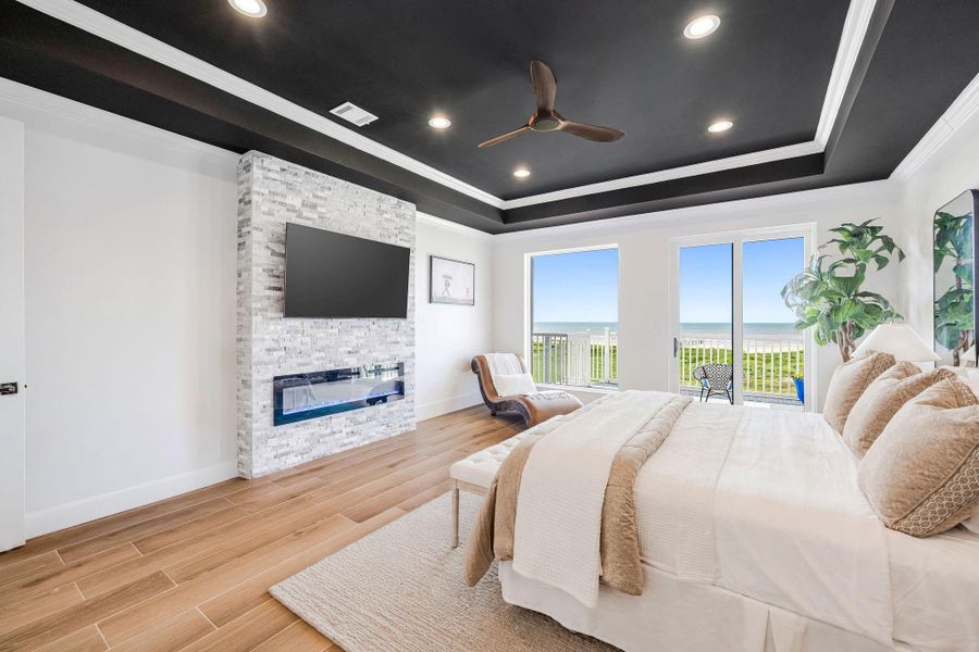 Primary bedroom on the first floor with views from your bed and balcony access.