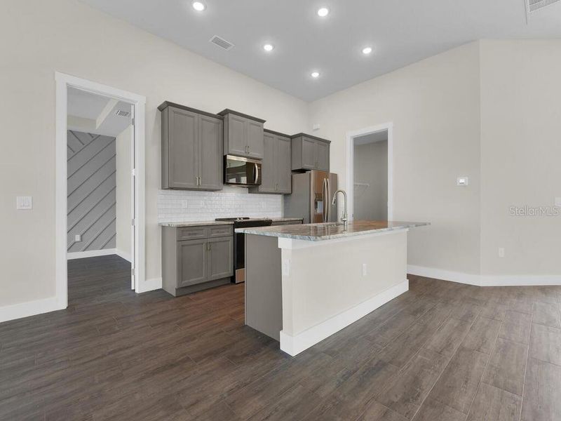 Furnished interior view inside a new home in , Port Charlotte (Image 6).