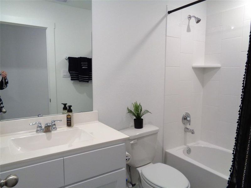 Guest Bathroom with tub/shower combination