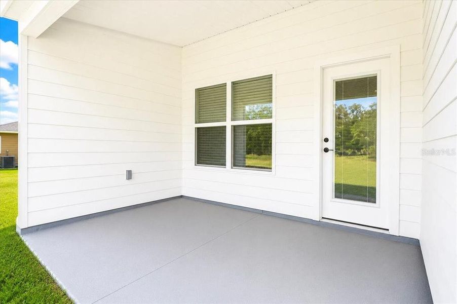 Exterior details and patio area of a home in Country Way South, Newberry (Image 3).