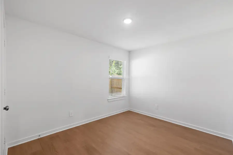 Spacious, unfurnished interior of a new home in Pinewood at Grand Texas, New Caney (Image 6).