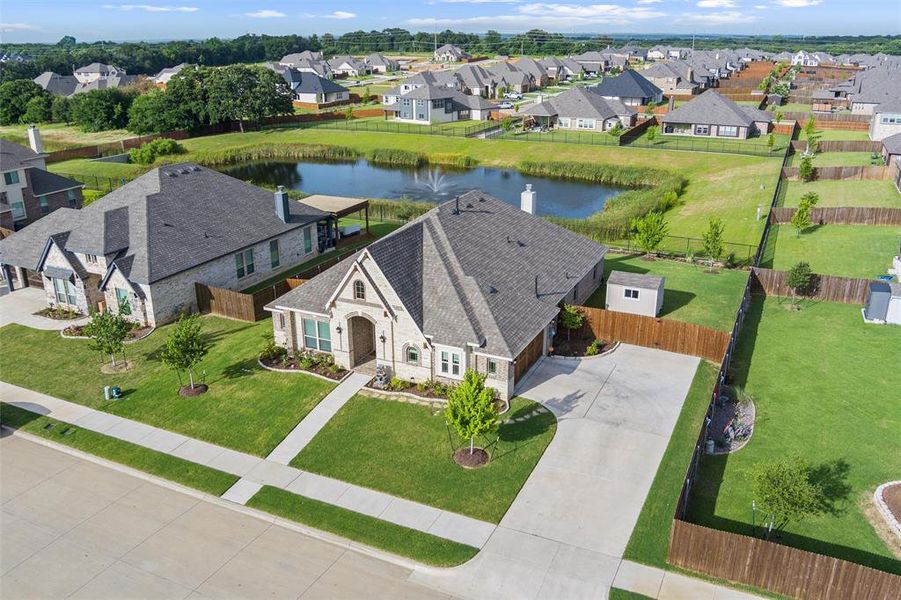 Front exterior of a new home in , Mansfield, TX, highlighting curb appeal (Image 23). Front exterior of a new home in , Mansfield, TX, highlighting curb appeal (Image 23).