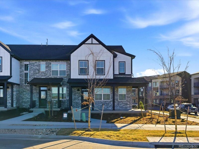 Front exterior of a new home in , Aurora, CO, highlighting curb appeal (Image 20).