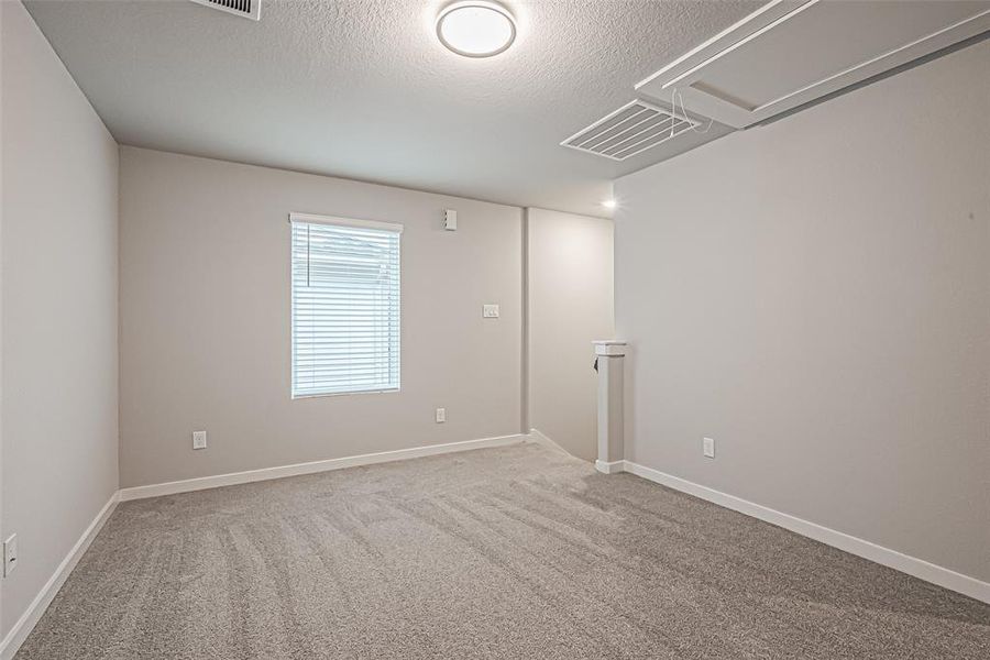 The bonus room upstairs provides the primary bedroom separation from the other bedrooms.