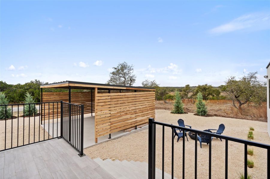 Exterior details and patio area of a home in , Wimberley (Image 24).