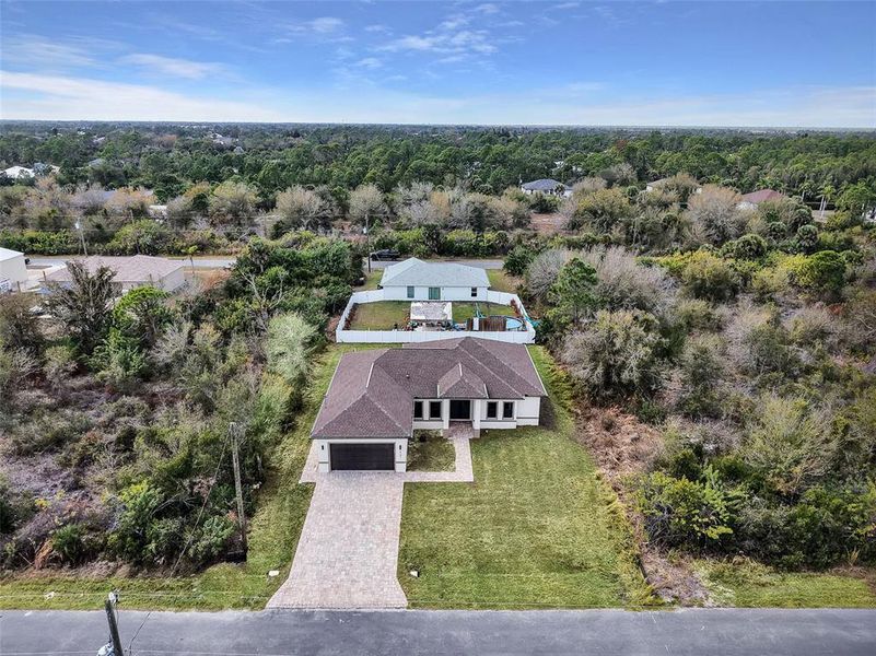 Front exterior of a new home in , Port Charlotte, FL, highlighting curb appeal (Image 26).