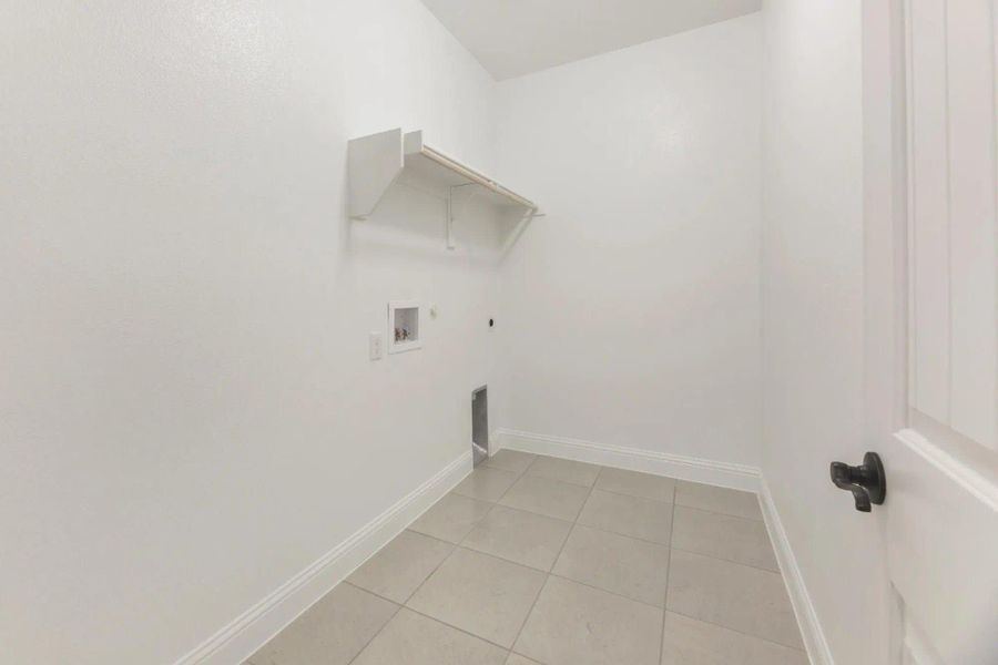 Utility Room | Concept 2404 at Massey Meadows in Midlothian, TX by Landsea Homes