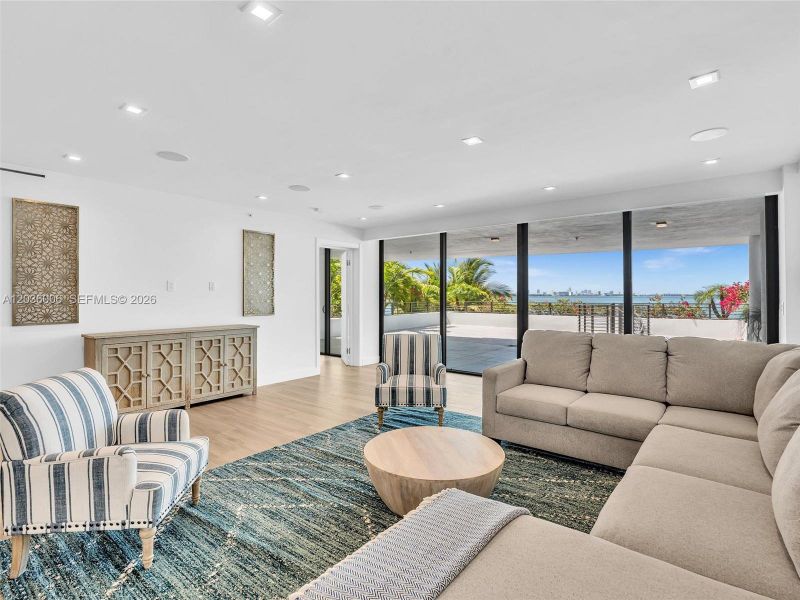 Living space with direct bay views.