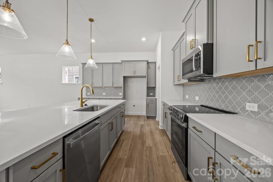 Furnished interior view inside a new home in The River District Townhomes, Charlotte (Image 7).