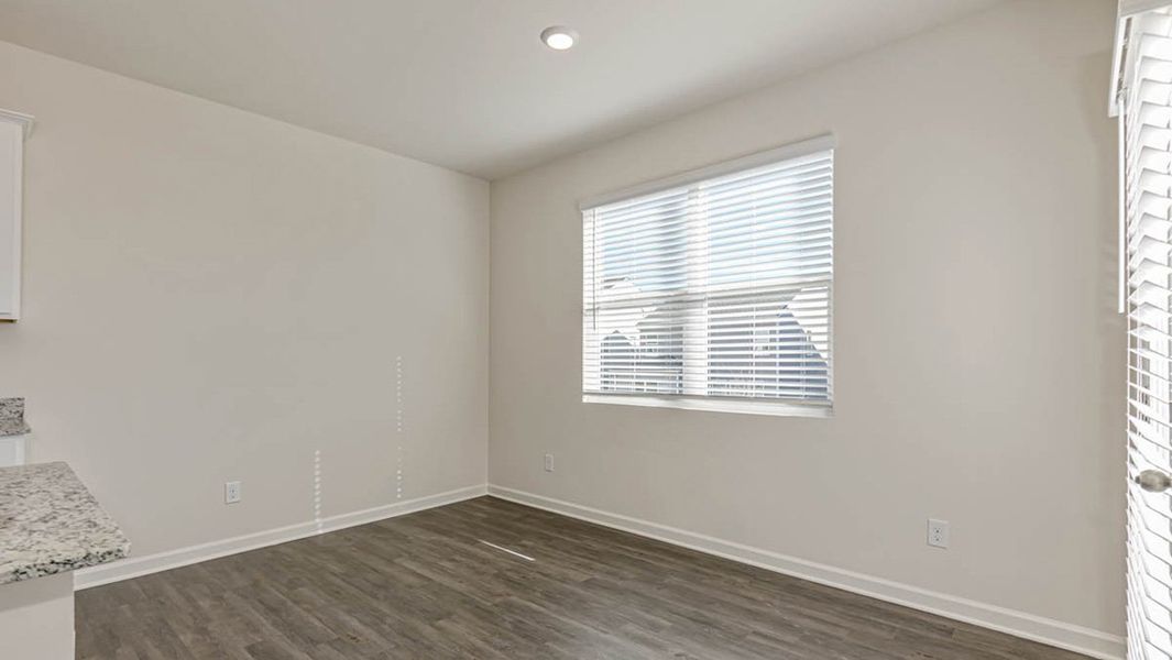 Representative unfurnished interior of a home built from the Darwin by D.R. Horton in Sherwood Manor, College Park (Image 9).