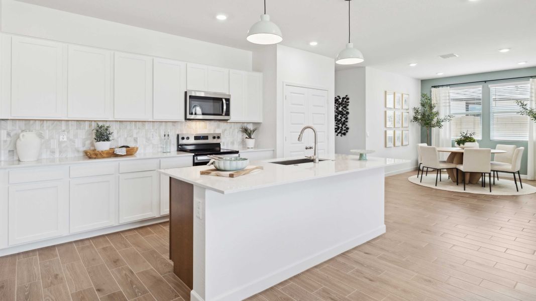 Representative furnished interior of a home built from the Stork by D.R. Horton in Apache Farms, Buckeye (Image 11).