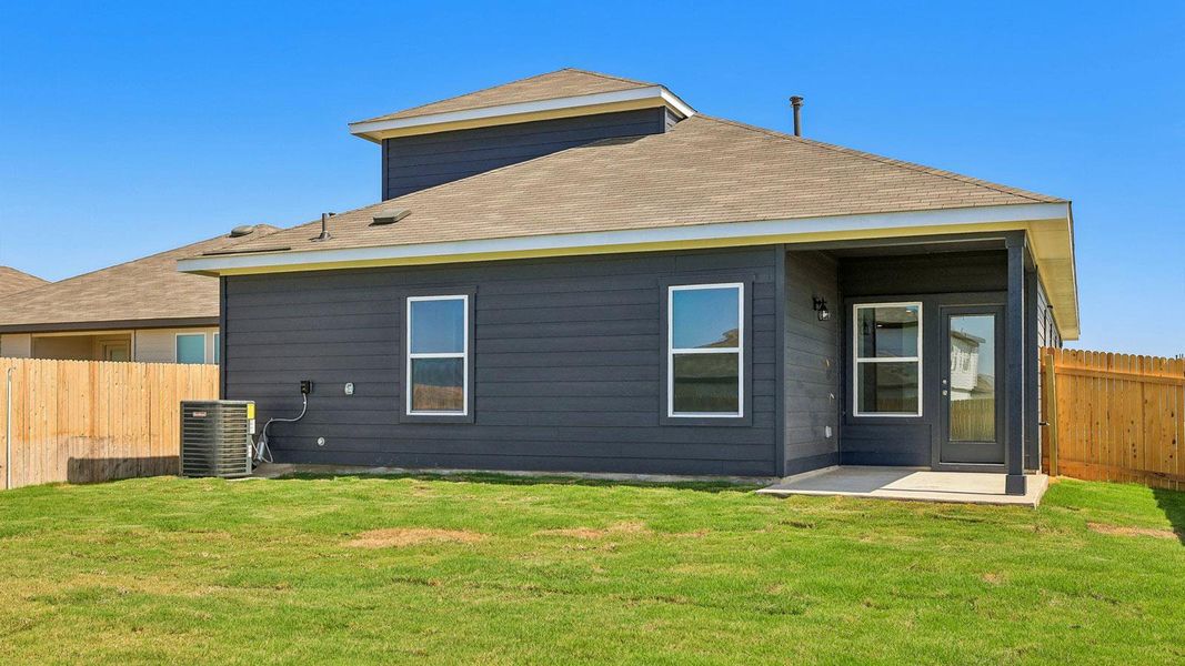 Exterior details and patio area of a home in Carillon, Manor (Image 15).