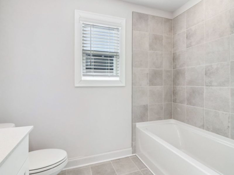 Furnished interior view inside a new home in Avalon - Reserve Series, Conyers (Image 8).