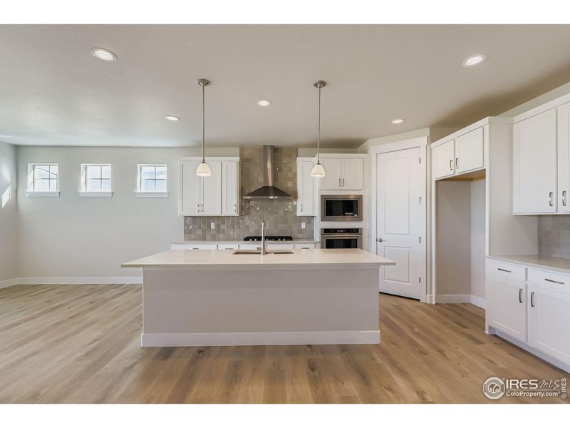 Furnished interior view inside a new home in Barefoot Lakes, Firestone (Image 8). Furnished interior view inside a new home in Barefoot Lakes, Firestone (Image 8).