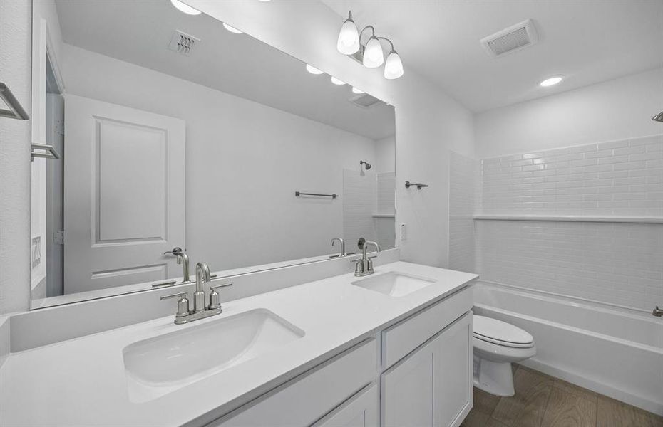 Secondary bath with double vanities