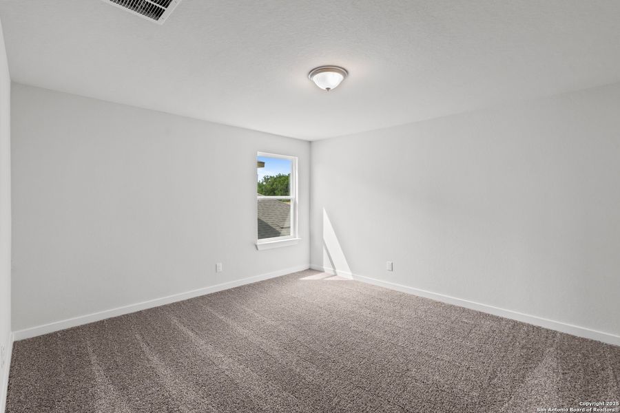 Spacious, unfurnished interior of a new home in The Meadows at Hunters Ranch, San Antonio (Image 29).