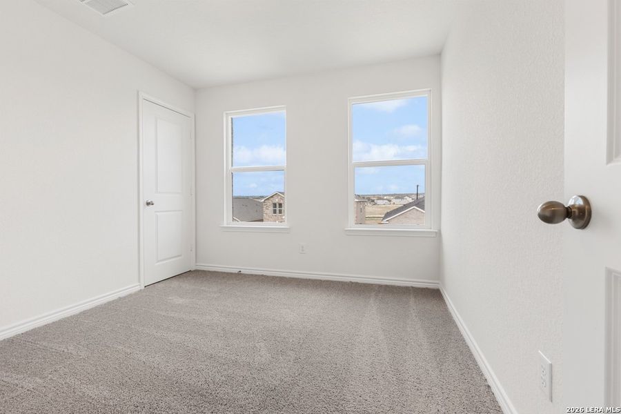 Spacious, unfurnished interior of a new home in Hidden Bluffs at TRP, San Antonio (Image 25).