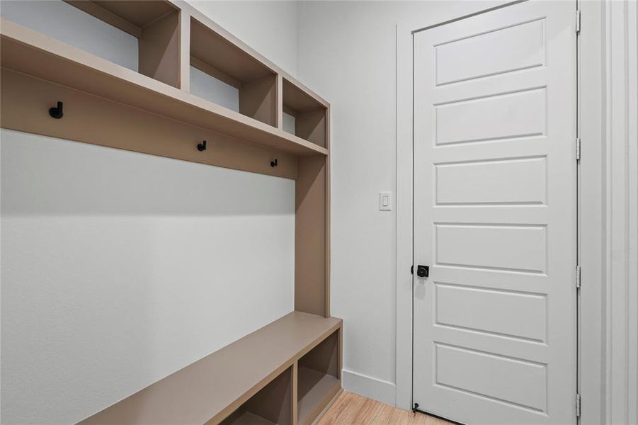 Mudroom featuring light hardwood / wood-style floors