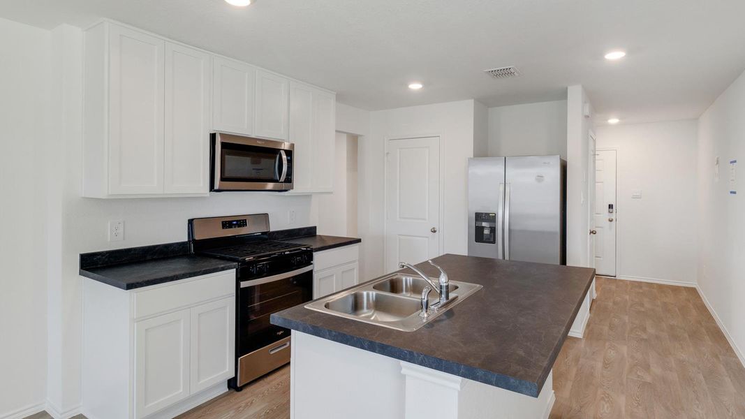 Furnished interior view inside a new home in Wayside, Uhland (Image 4).