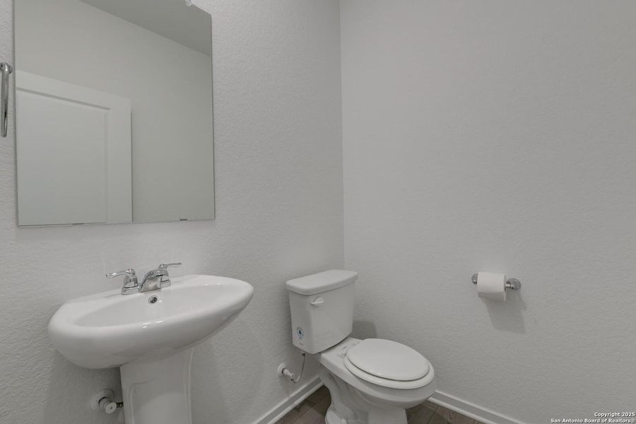 Furnished interior view inside a new home in Meadows at Hennersby Hollow 40's, San Antonio (Image 14).