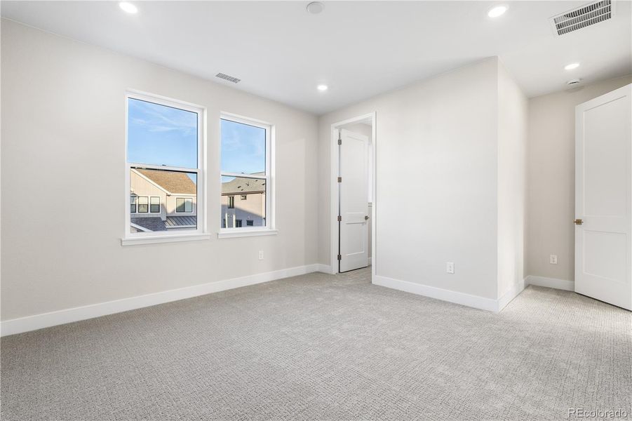 Spacious, unfurnished interior of a new home in Stargaze at Solstice, Littleton (Image 39).