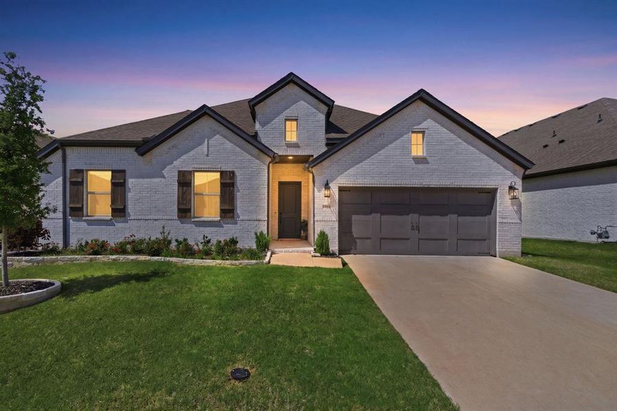 White brick exterior with dark trim and architectural gables White brick exterior with dark trim and architectural gables