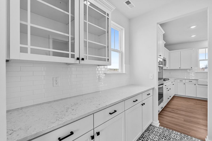 Furnished interior view inside a new home in Fieldstone, Lexington (Image 7).