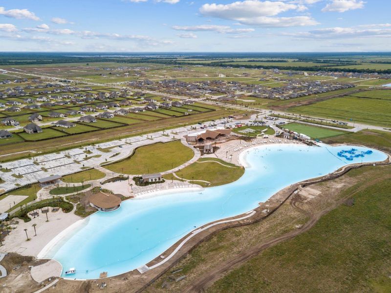 Stunning aerial of the community’s tropical lagoon, the crown jewel of the neighborhood’s resort-style amenities. Stunning aerial of the community’s tropical lagoon, the crown jewel of the neighborhood’s resort-style amenities.