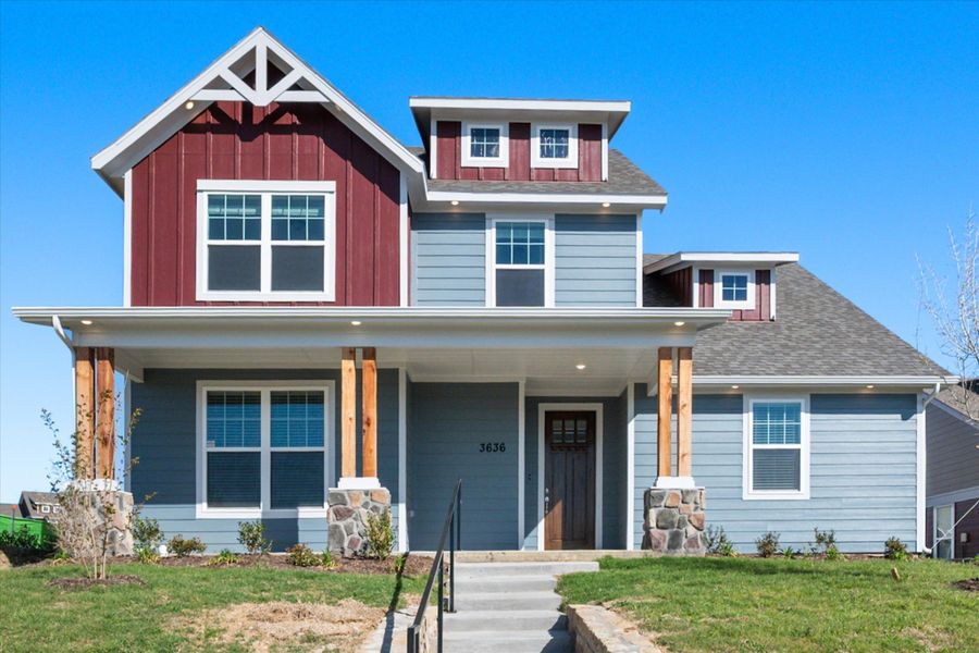 Front exterior of a new home in Heritage Towne, Midlothian, TX, highlighting curb appeal (Image 28).