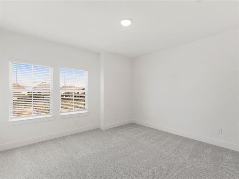 Spacious, unfurnished interior of a new home in Royal Court, Little Elm (Image 26).