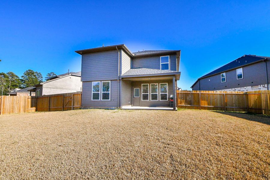 Exterior details and patio area of a home in , Tomball (Image 20). Exterior details and patio area of a home in , Tomball (Image 20).