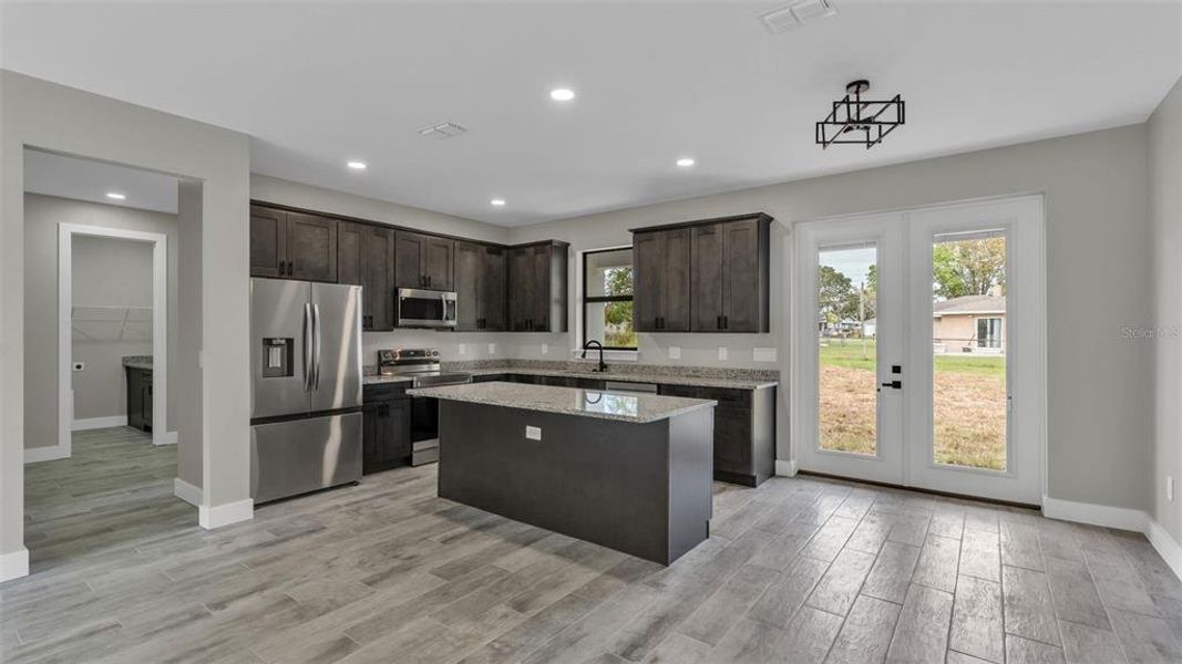 Furnished interior view inside a new home in , Winter Haven (Image 5). Furnished interior view inside a new home in , Winter Haven (Image 5).