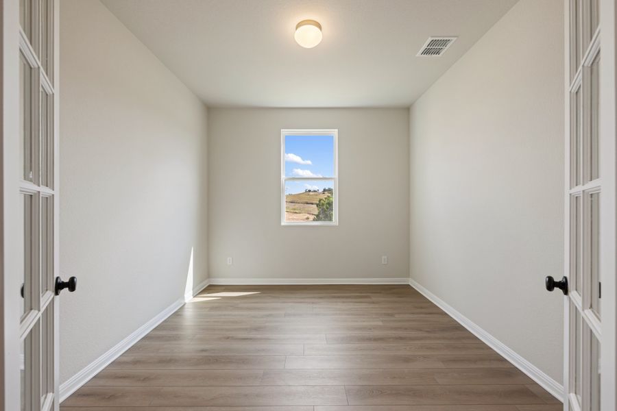 Representative unfurnished interior of a home built from the Granbury by Ashton Woods in The Trails at Carmel, Pflugerville (Image 21).