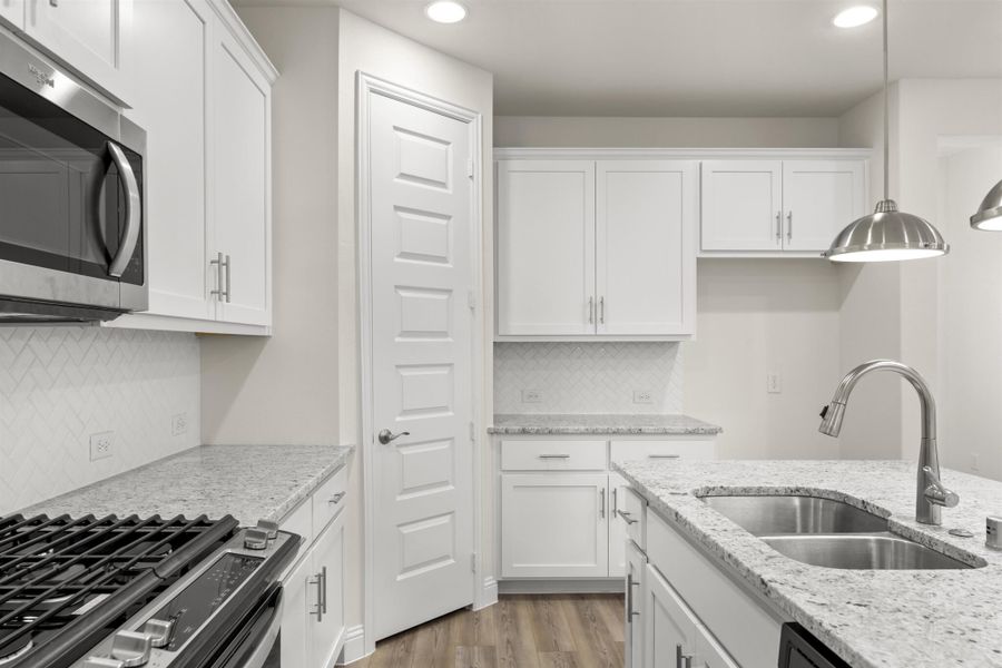 Representative furnished interior of a home built from the Juniper by UnionMain Homes in Edgewater, Fate (Image 10).