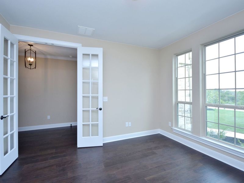 Representative unfurnished interior of a home built from the Madera II by Giddens Homes in Scofield Farms Estates, Georgetown (Image 368).