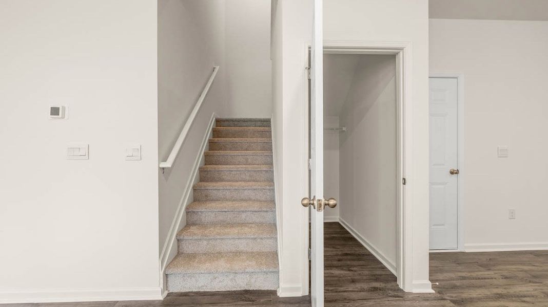 Representative unfurnished interior of a home built from the Dennis by D.R. Horton in Glenmaye, Hampton (Image 24).