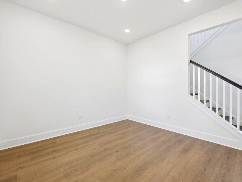 Spacious, unfurnished interior of a new home in The Coves at Lakes of Cane Bay II, Summerville (Image 24). Spacious, unfurnished interior of a new home in The Coves at Lakes of Cane Bay II, Summerville (Image 24).