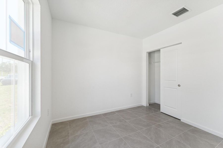 Spacious, unfurnished interior of a new home in Aspire at Port St. Lucie, Port St. Lucie (Image 23).