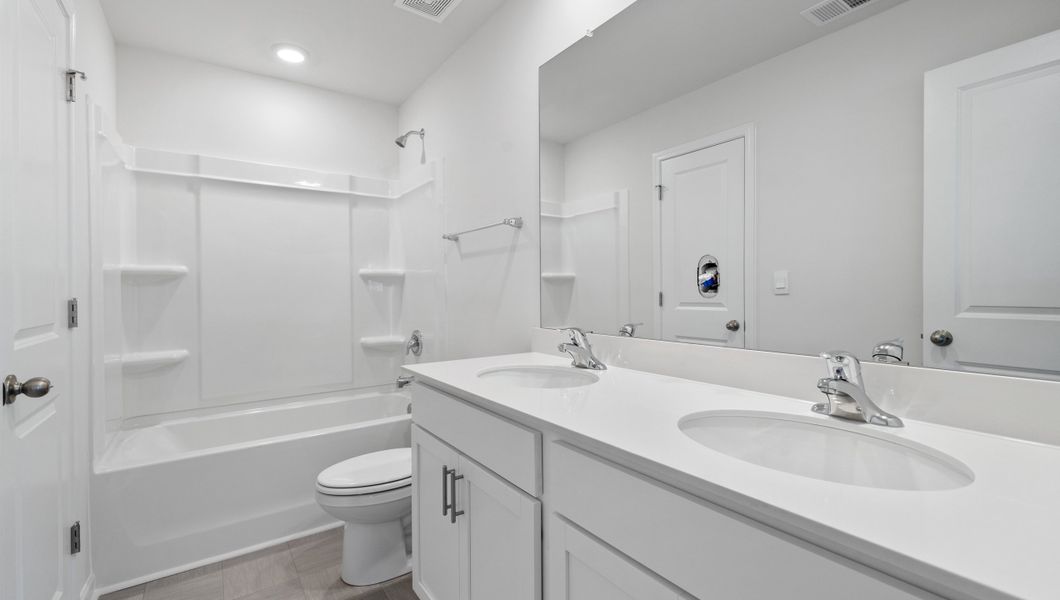 Furnished interior view inside a new home in Hunters Ridge, Woodruff (Image 13).