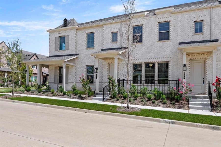 Front exterior of a new home in Parkside, Mansfield, TX, highlighting curb appeal (Image 17). Front exterior of a new home in Parkside, Mansfield, TX, highlighting curb appeal (Image 17).