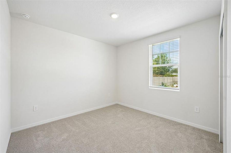 Spacious, unfurnished interior of a new home in Pine Ridge Meadows, Hudson (Image 34).