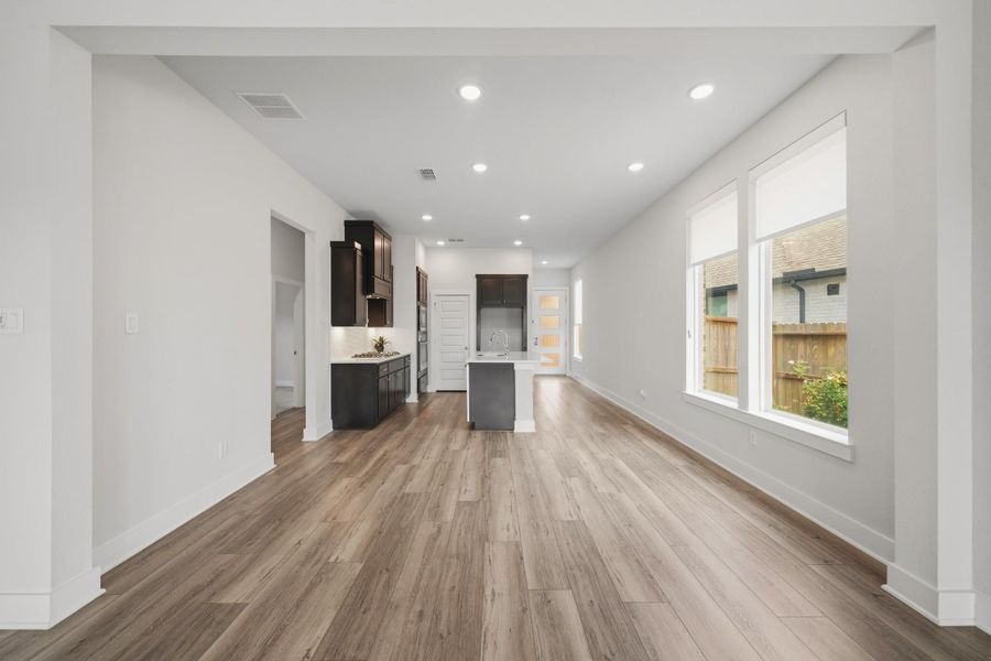 Expansive living area designed for both everyday comfort and entertaining. Expansive living area designed for both everyday comfort and entertaining.