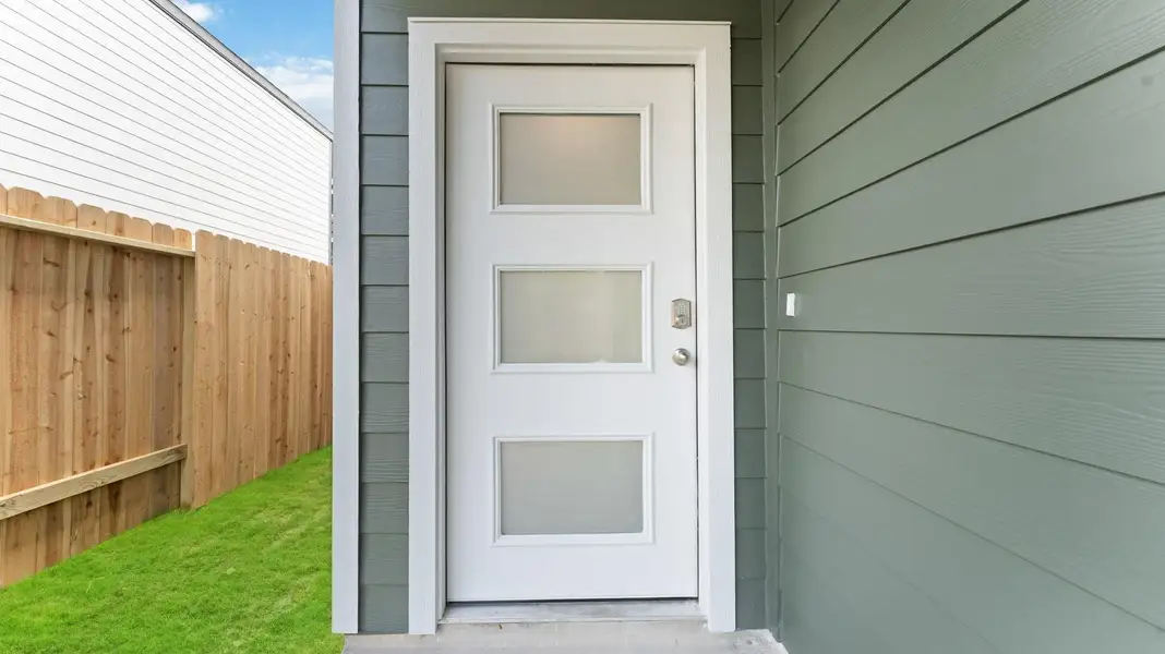 Exterior details and patio area of a home in Alaia Crossing, Houston (Image 3).