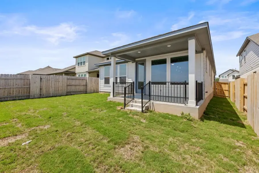 Exterior details and patio area of a home in Lariat, Liberty Hill (Image 24). Exterior details and patio area of a home in Lariat, Liberty Hill (Image 24).