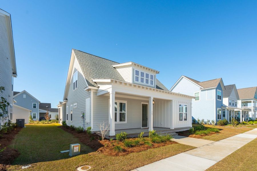 Front exterior of a new home in Nexton, Summerville, SC, highlighting curb appeal (Image 12). Front exterior of a new home in Nexton, Summerville, SC, highlighting curb appeal (Image 12).