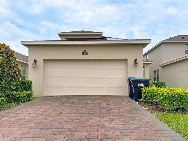 Front exterior of a new home in , Winter Garden, FL, highlighting curb appeal (Image 28).