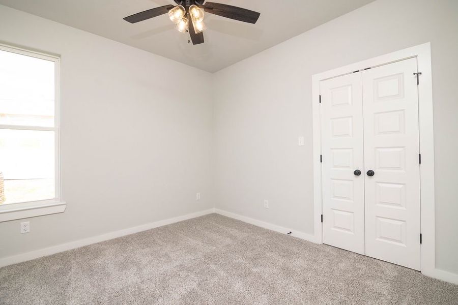 Representative unfurnished interior of a home built from the The Laurel by Avonley Homes in Greens Prairie Reserve, College Station (Image 22).