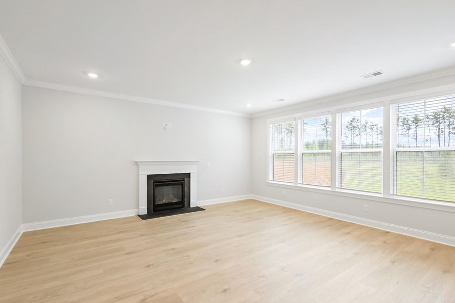 Spacious, unfurnished interior of a new home in Tidewater at Lakes of Cane Bay, Summerville (Image 46).