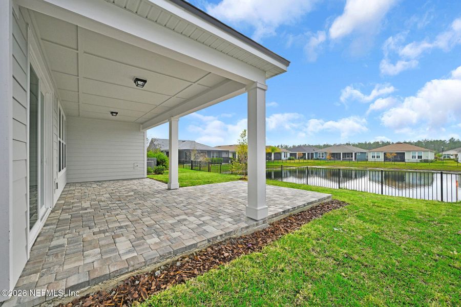 Exterior details and patio area of a home in Summer Bay at Grand Oaks, St. Augustine (Image 4).