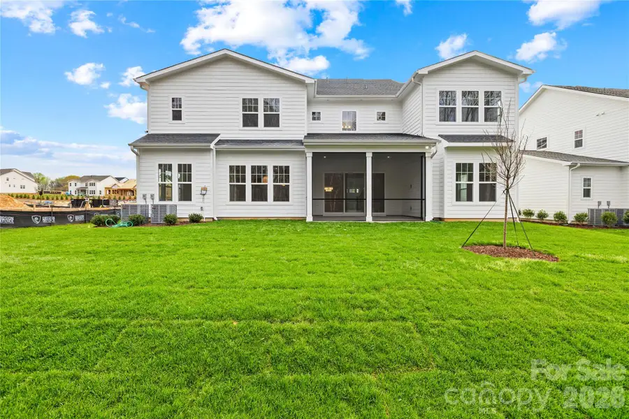 Exterior details and patio area of a home in Coventry Glen, Huntersville (Image 4).